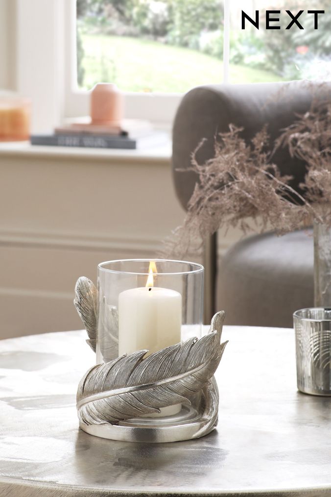 Glass and store silver candle holders