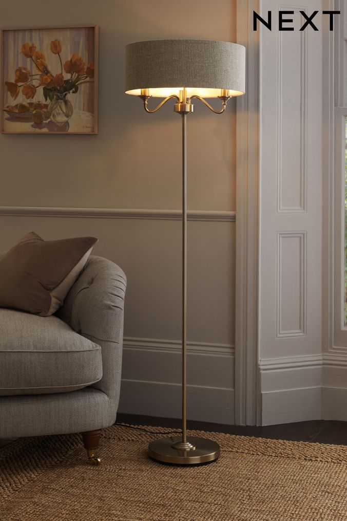 Floor lamp outlet next to couch