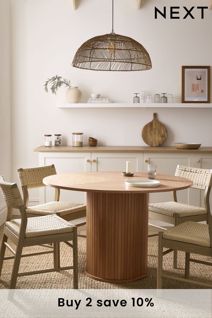 Next round shop dining table