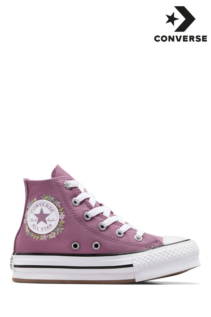 Pink knee store high converse