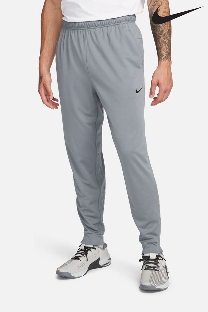 Nike grey cuffed joggers mens new arrivals
