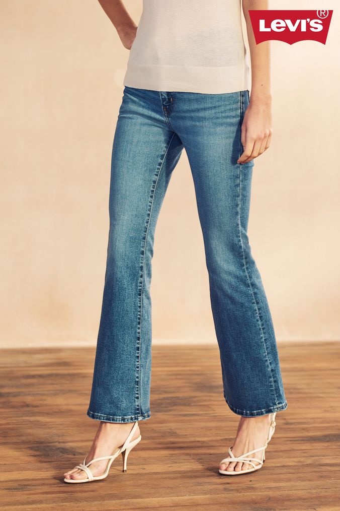 Womens levi bell bottom jeans deals