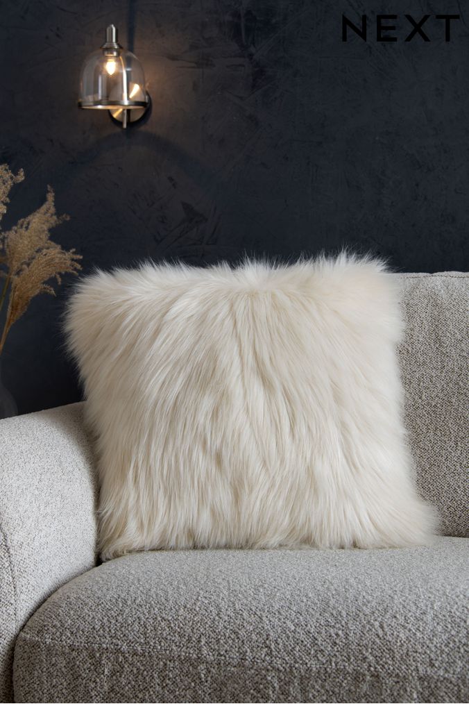 Ivory White Long Faux Fur Cushion (D84715) | £18