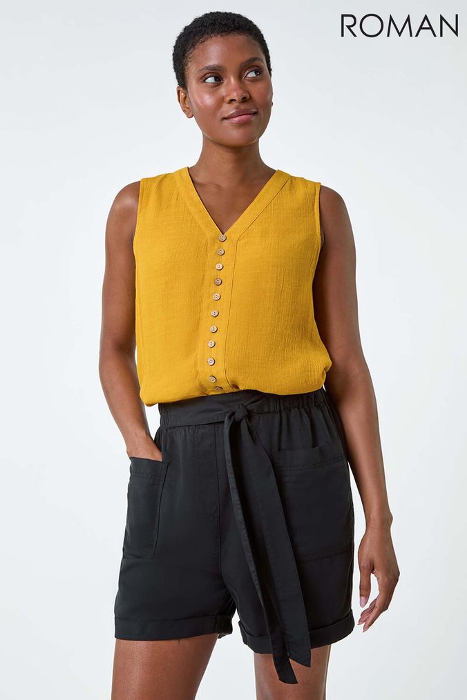 Mustard yellow vest top store