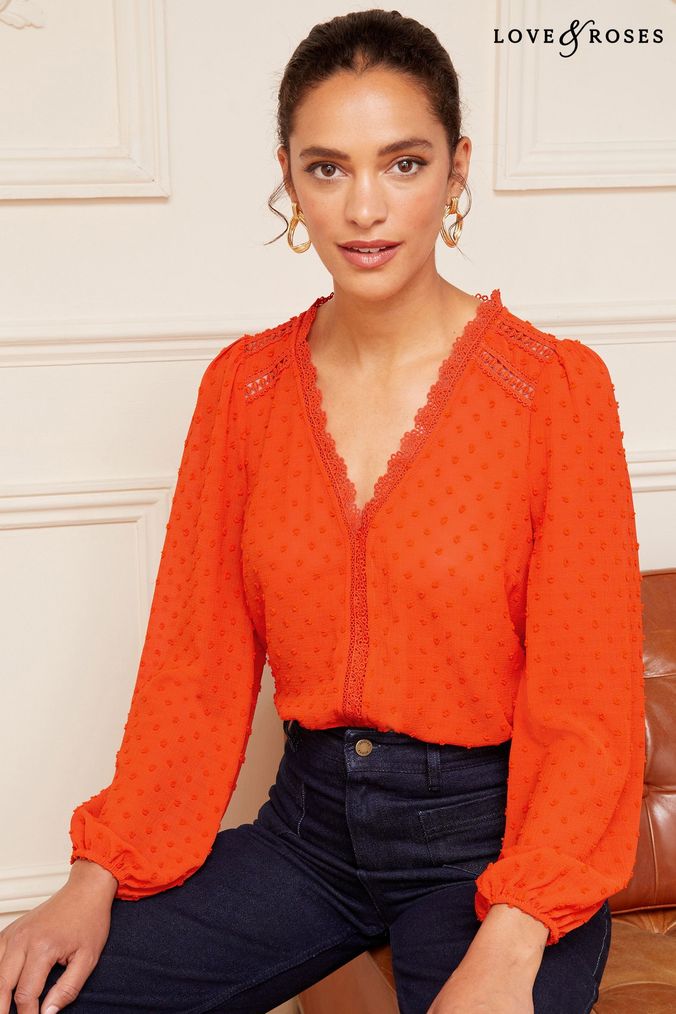 Ladies orange deals tops