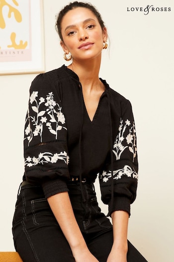 Bootcut & Flare Black V Neck Embroidered Sleeve Jersey Top (K71281) | £34