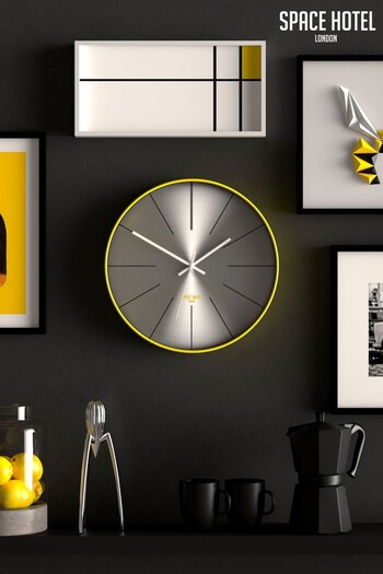 Space Hotel Yellow District 12 Wall Clock (M35262) | £45
