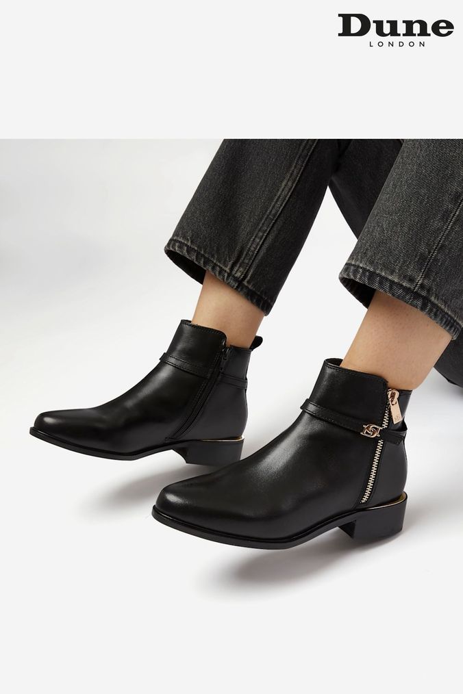 AspennigeriaShops Buy Women s Boots Black Dune London Footwear Online Jenner changed into a pair of more comfortable white sneakers to head home