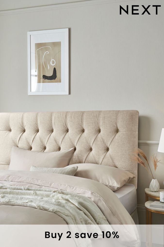 Beige store upholstered headboard
