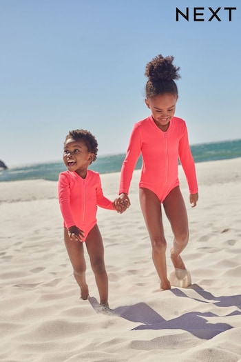 Fluro Pink Long Sleeve Textured Swimsuit (3mths-16yrs) (N16389) | £18 - £24