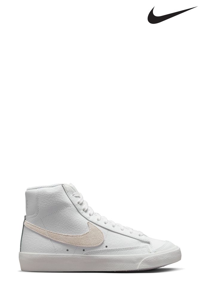 White nike high top tops