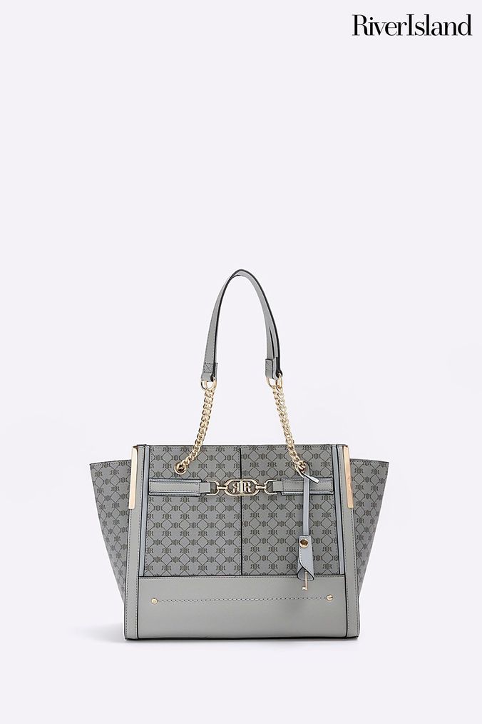River island black chain handle pom pom tote bag shop