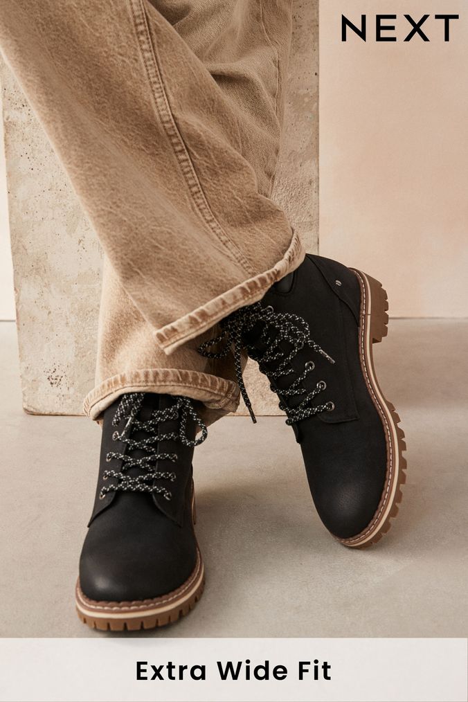 Black boots brown laces best sale