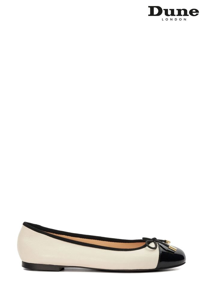 Ladies cream sale flat shoes