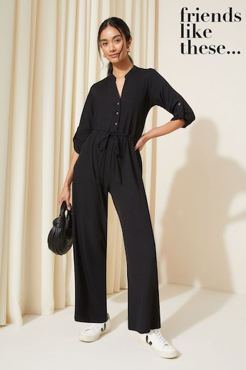 Trending: Animal Decor Black Petite Jersey Long Sleeve Cinched Waist Jumpsuit (Q45365) | £42