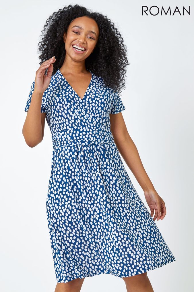 Polka dot wrap dress uk top