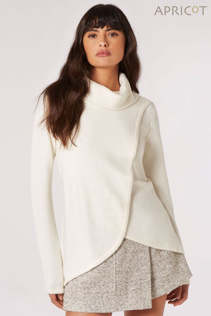 Girls cream new arrivals roll neck