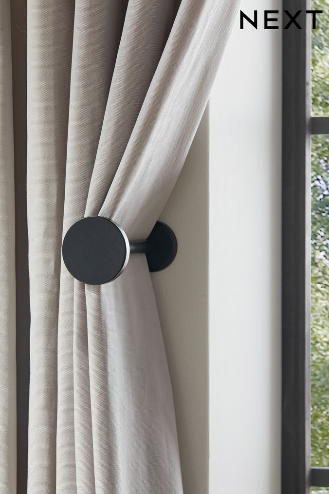 Metal sales curtain holdbacks