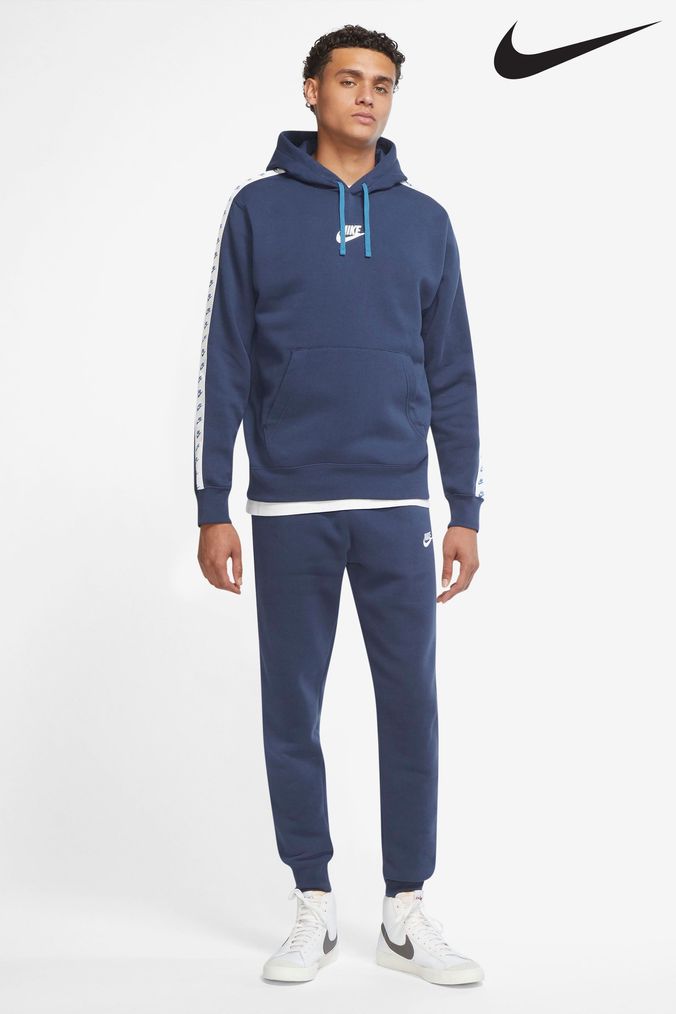 Navy and white nike tracksuit top