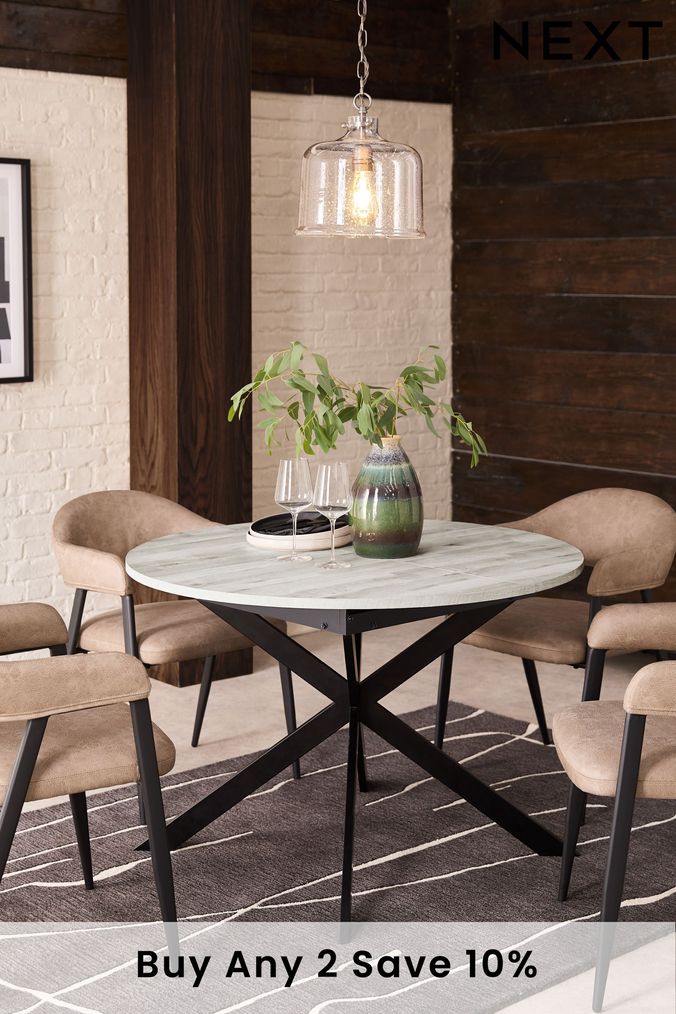 Next round dining outlet table and chairs