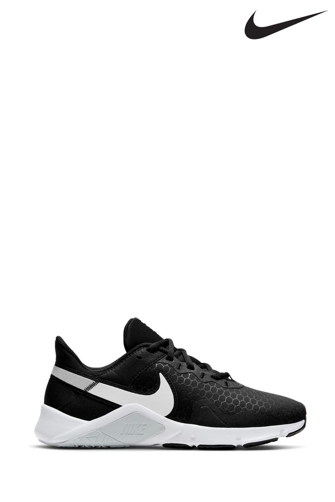 Ladies black leather nike trainers best sale