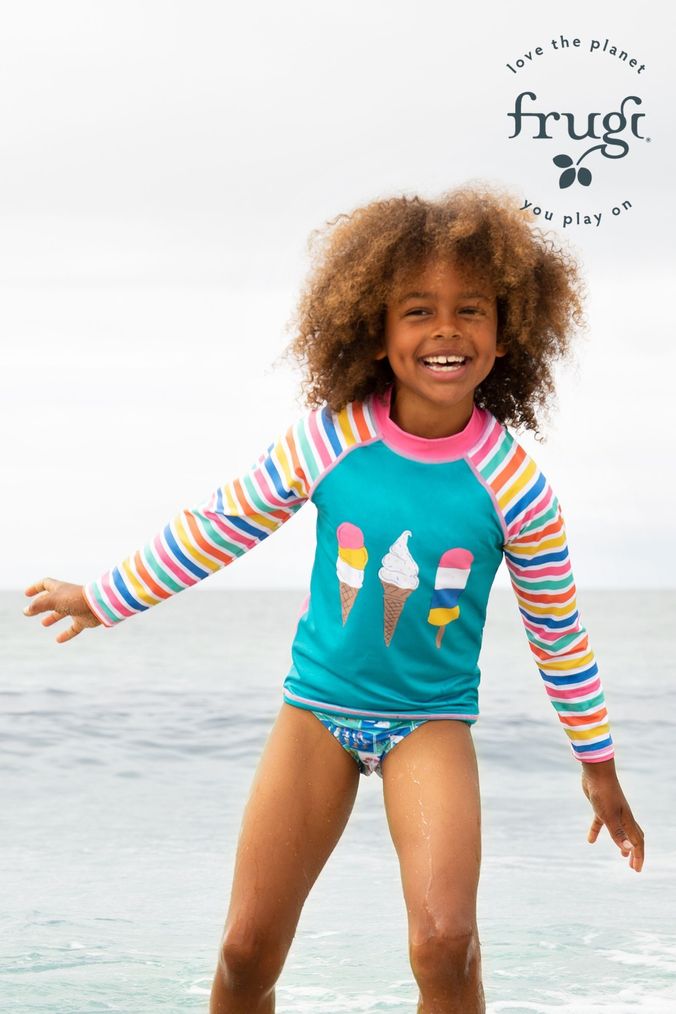 Little girls store wearing swimsuits