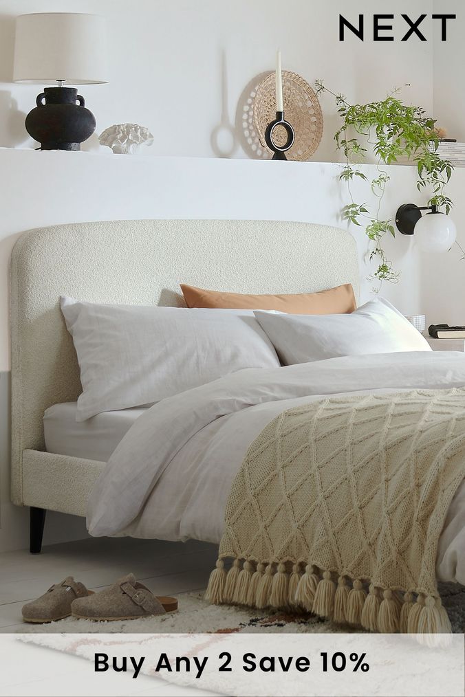 White upholstered headboard and hot sale frame
