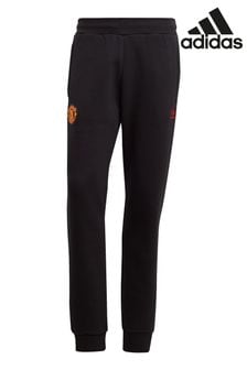 adidas Black Manchester United x Originals Essentials Joggers (118069) | SGD 97