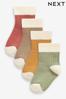 Nevpadljive mavrične barve - Komplet 4 parov nogavic za dojenčke (0 mesecev–2 let) (119783) | €5