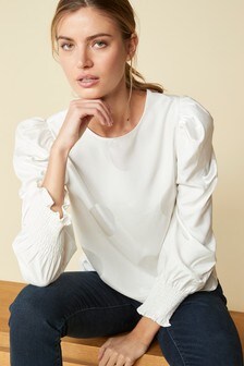 Chemisier en jacquard à pois avec manches volumineuses