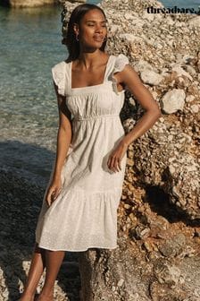 أبيض - فستان سموك متوسط الطول قماش برودري قطن موديل Anglaise من Threadbare (194114) | 233 د.إ