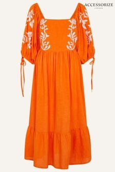 Pomarańczowa sukienka midi Accessorize z bufiastymi rękawami, haftem z ozdobnym nadrukiem (228036) | 190 zł