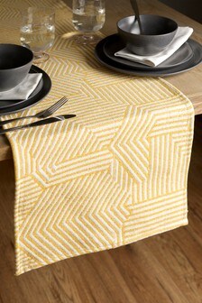Chemin de table ocre à motif géométrique