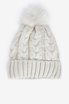 Bonnet à pompon en maille torsadée