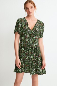 Robe courte imprimée avec nœud à l'encolure