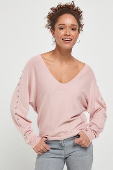 Pull à manches dolman cloutées