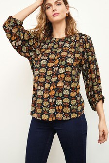 Haut avec épaule boutonnée