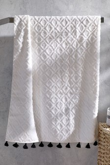 Serviette tuftée à motif géométrique