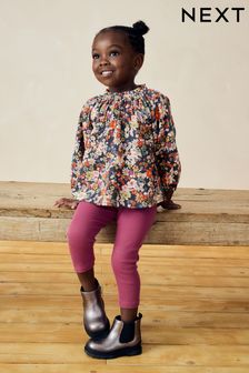 Boy wearing girl leggings top