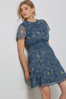 Robe scintillante à manches évasées