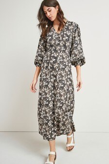 Robe mi-longue à manches volumineuses