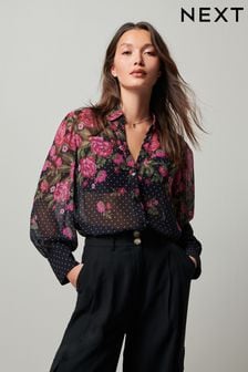 Schwarz - Langärmelige Bluse mit Blumen und Punkten​​​​​​​ (431936) | 30 €