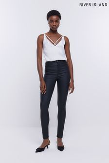 River Island Black Coated High Waisted Skinny Jeans (453586) | OMR25