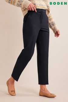 Синий - Зауженные эластичные брюки Boden (457733) | €63