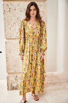 Robe mi-longue à manches volumineuses