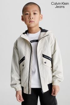 Beżowa chłopięcy kurtka Calvin Klein Jeans z lampasami z logo (489114) | 390 zł