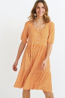 Robe à encolure dégagée avec boutons sur le devant