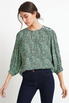 Haut avec épaule boutonnée