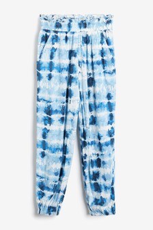 מכנסיים בגזרה רפויה עם הדפס  (גילאי 3 עד 16)