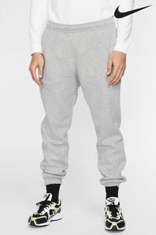 Светло-серый - Спортивные брюки с манжетами Nike Club (541992) | €66